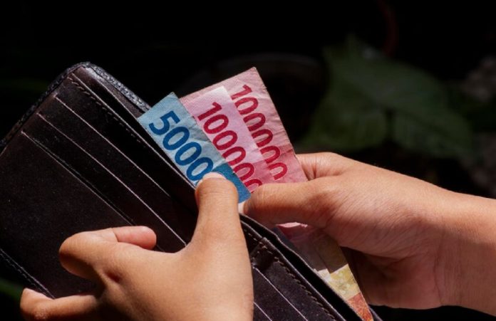 Rupiah Melemah ke Rp17.879 per Dolar AS